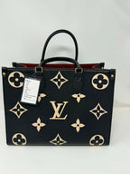Louis Vuitton On The Go MM Empriente Leather Black and Ivory