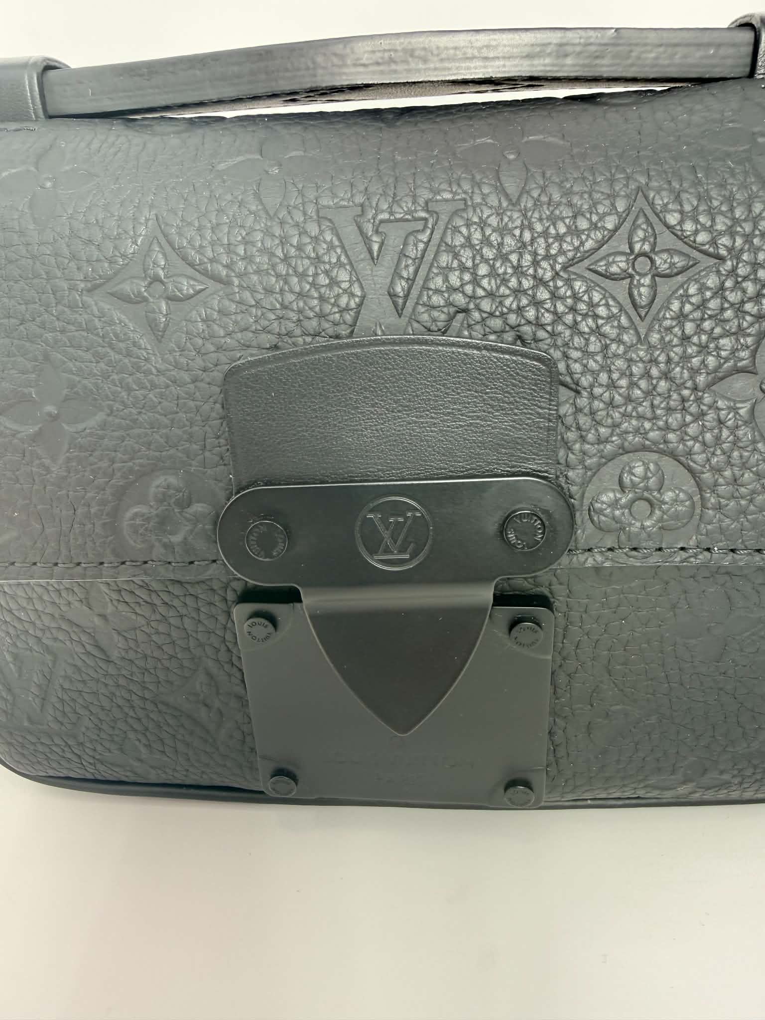 Louis Vuitton S Lock Sling Bag in black Taurillon leather