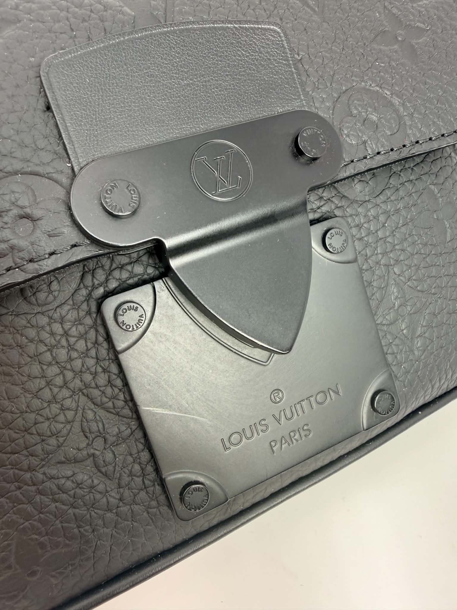 Louis Vuitton S Lock Sling Bag in black Taurillon leather