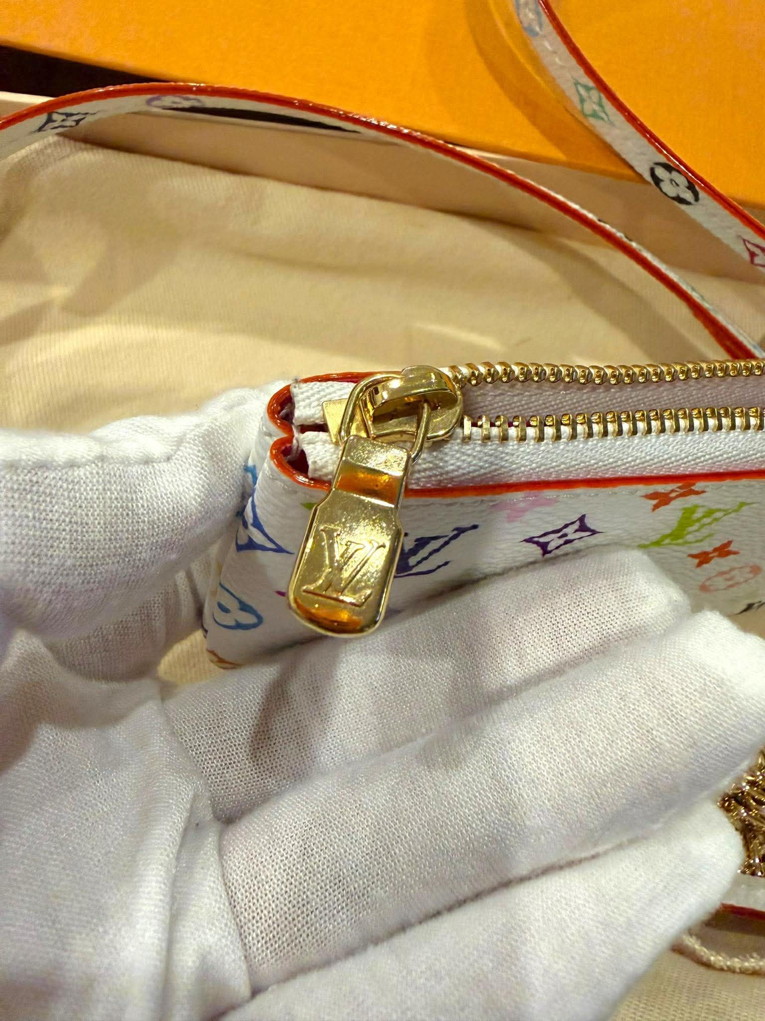 Louis Vuitton	Takashi Murikami Phone Holder/ Card Charm