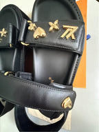 Louis Vuitton	Sunset Platform Comfort Sandal platform Black with Gold Charms