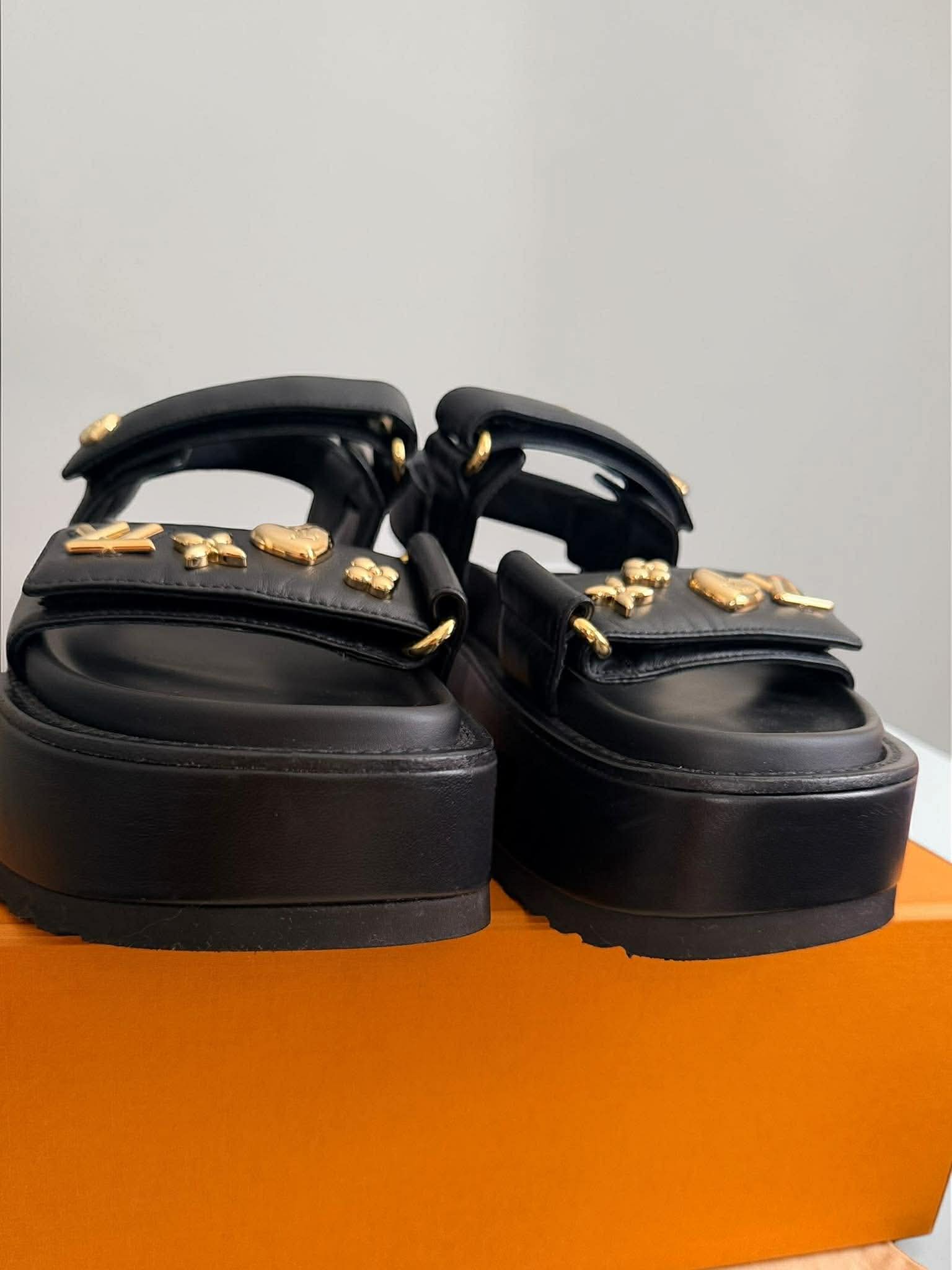 Louis Vuitton	Sunset Platform Comfort Sandal platform Black with Gold Charms