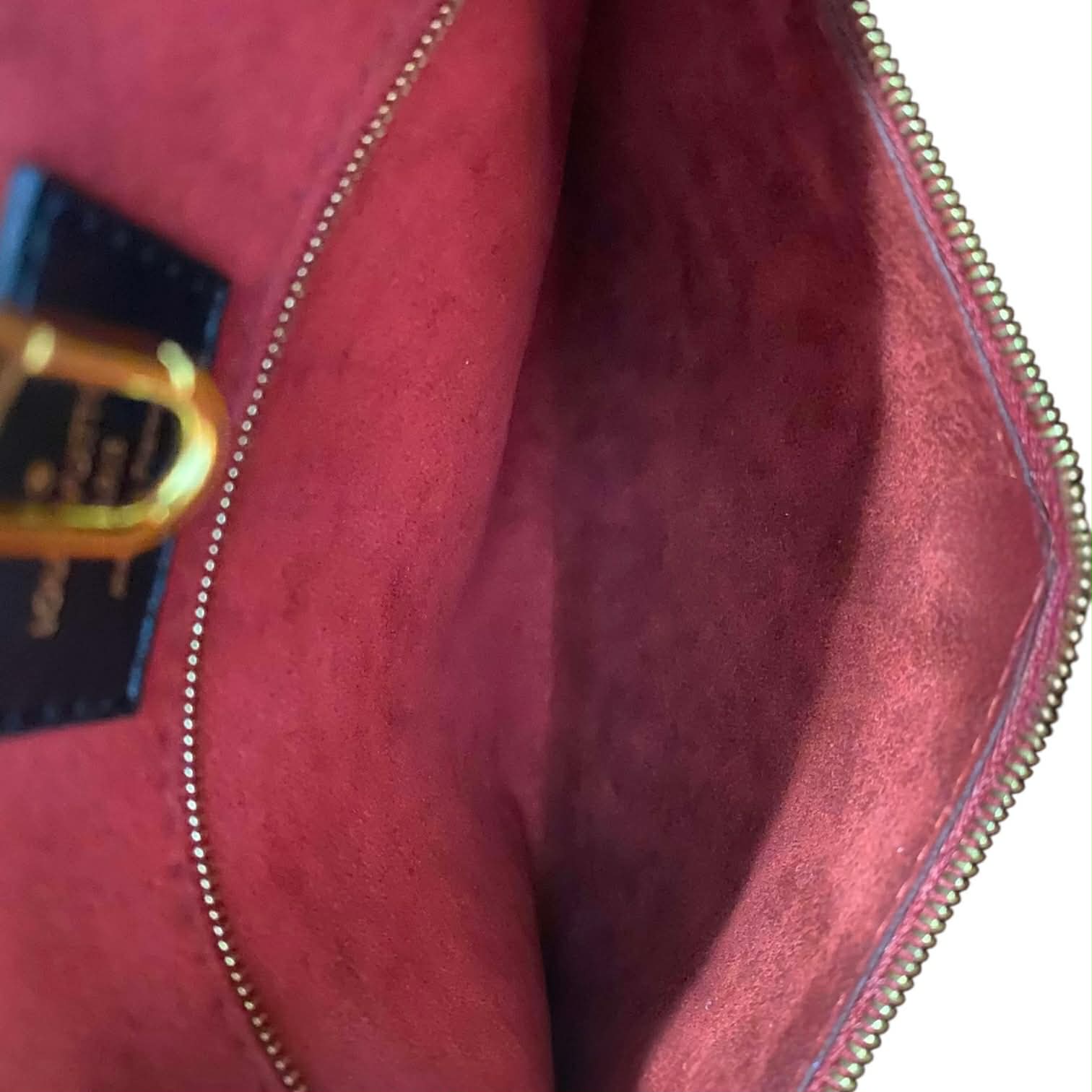 Louis Vuitton On The Go MM Empriente Leather Black and Ivory