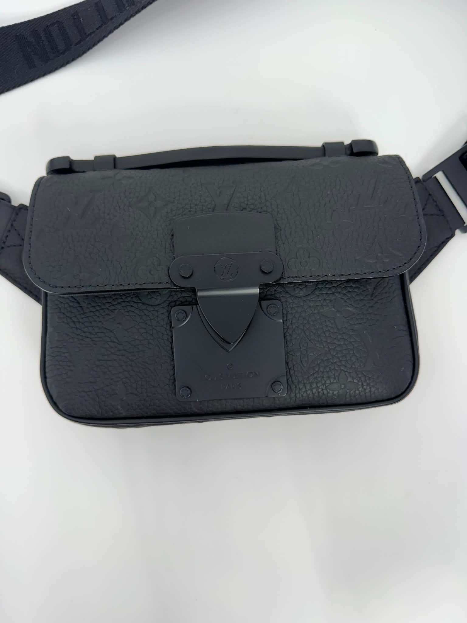 Louis Vuitton S Lock Sling Bag in black Taurillon leather