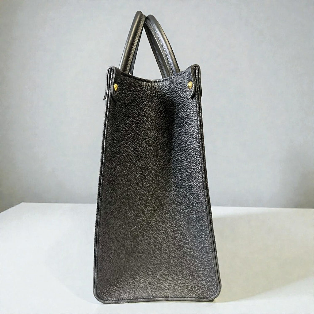 Louis Vuitton On The Go MM Empriente Leather Black and Ivory