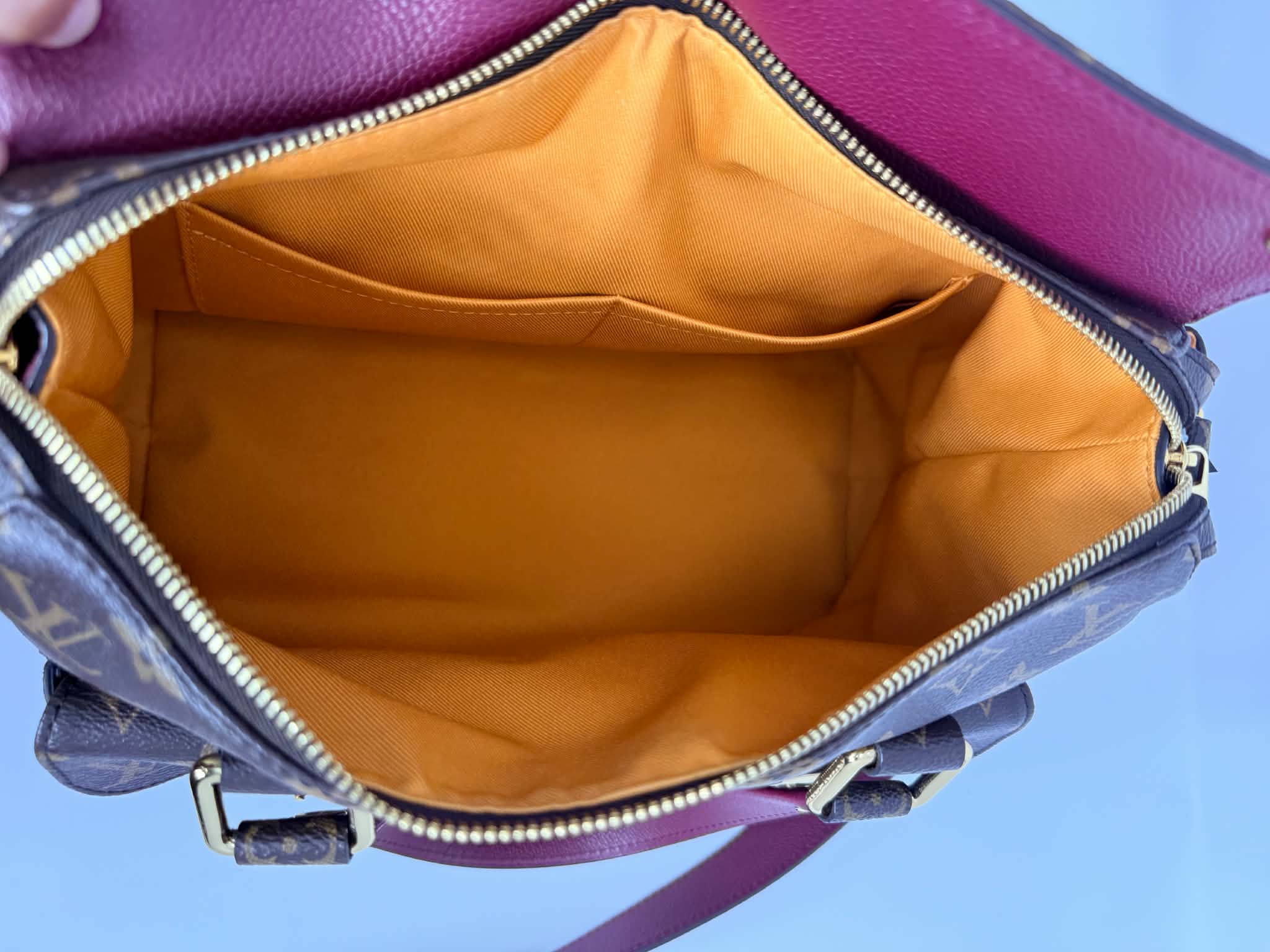 Louis Vuitton Monogram Manhattan NM Raisin