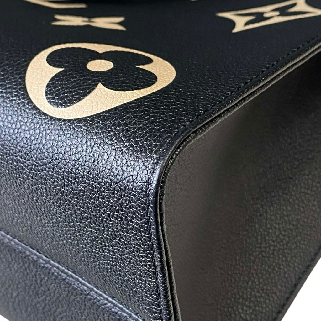 Louis Vuitton On The Go MM Empriente Leather Black and Ivory