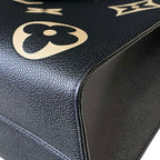 Louis Vuitton On The Go MM Empriente Leather Black and Ivory