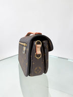 Louis Vuitton Monogram East West Métis
