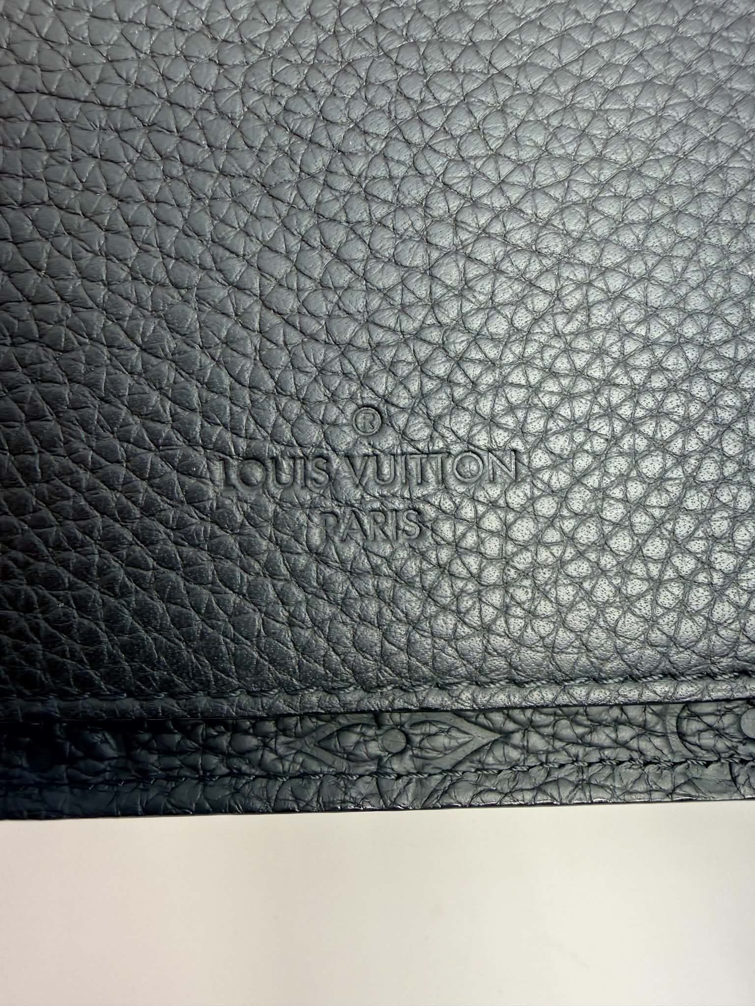 Louis Vuitton S Lock Sling Bag in black Taurillon leather
