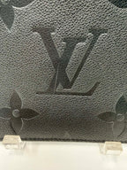 Louis Vuitton Neverfull MM Empreinte Leather Black with Pouch