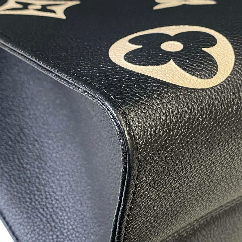 Louis Vuitton On The Go MM Empriente Leather Black and Ivory