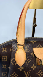 Louis Vuitton Monogram Rivoli PM