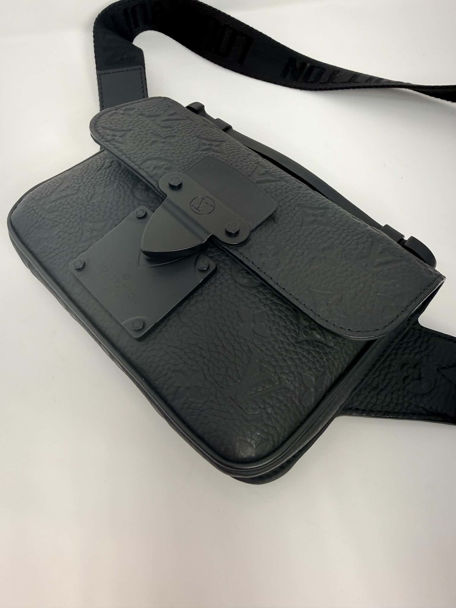 Louis Vuitton S Lock Sling Bag in black Taurillon leather