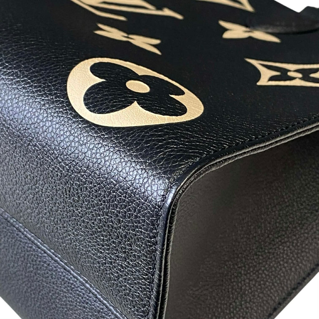 Louis Vuitton On The Go MM Empriente Leather Black and Ivory