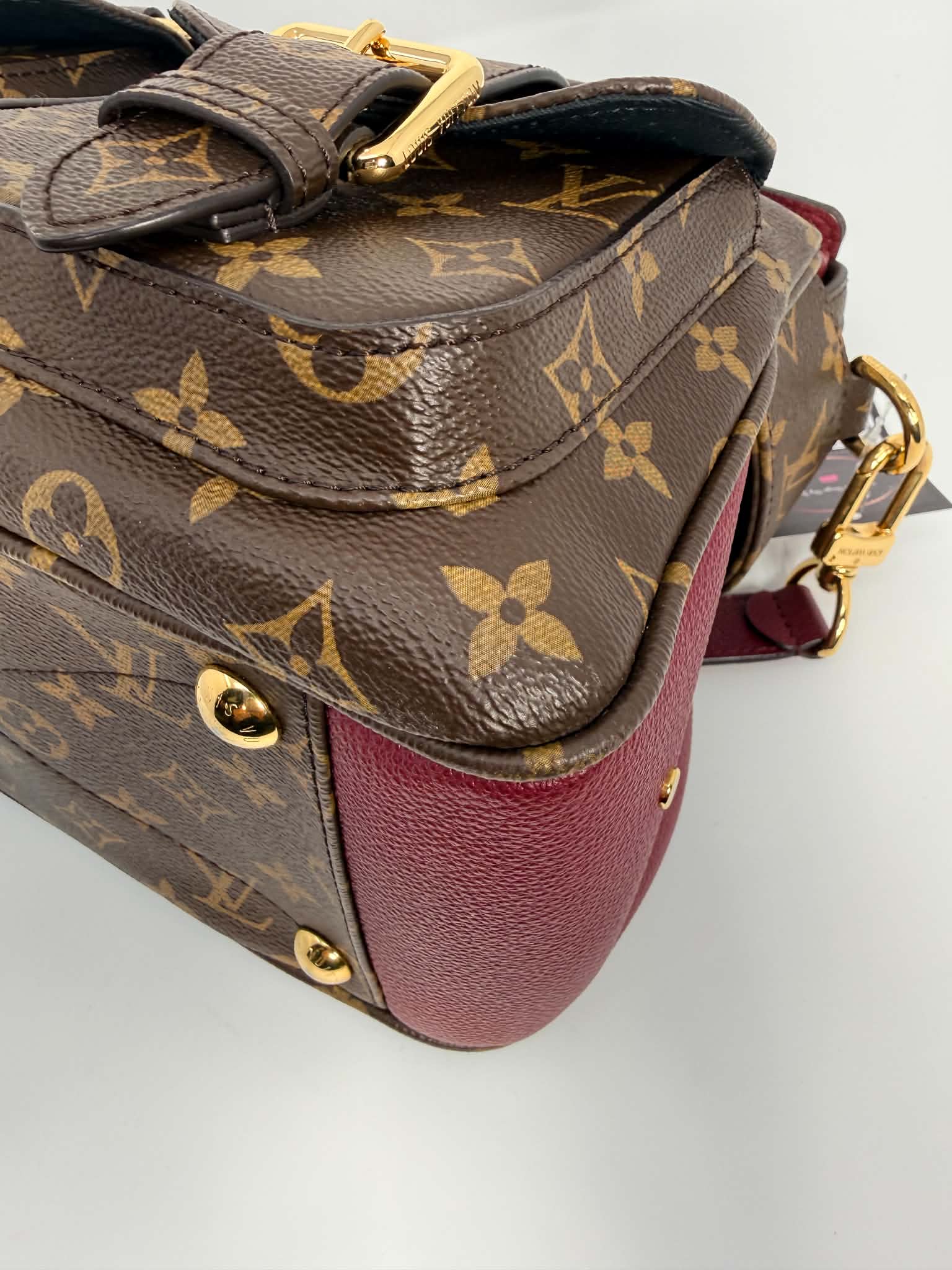 Louis Vuitton Monogram Manhattan NM Raisin